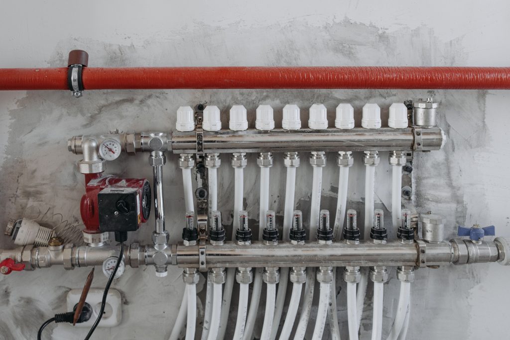 Manifold gauge set connected to an HVAC refrigerant line
